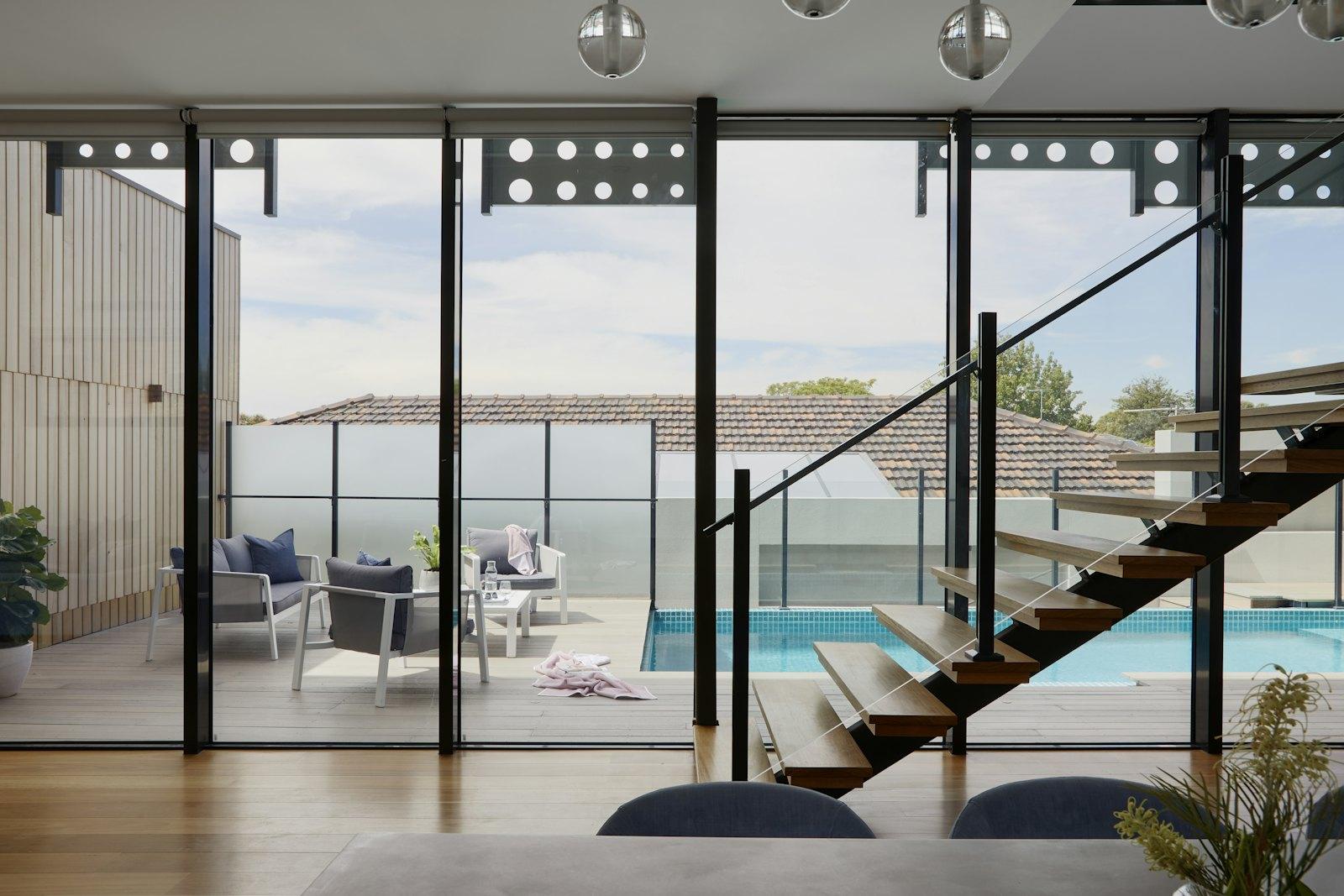 Glass staircase inside a modern home
